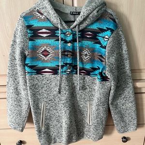 Aztec print sweater. Size: L